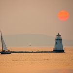Lighthouse and sunset over Lake Champlain